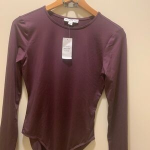 "And now This" womans size small body suit